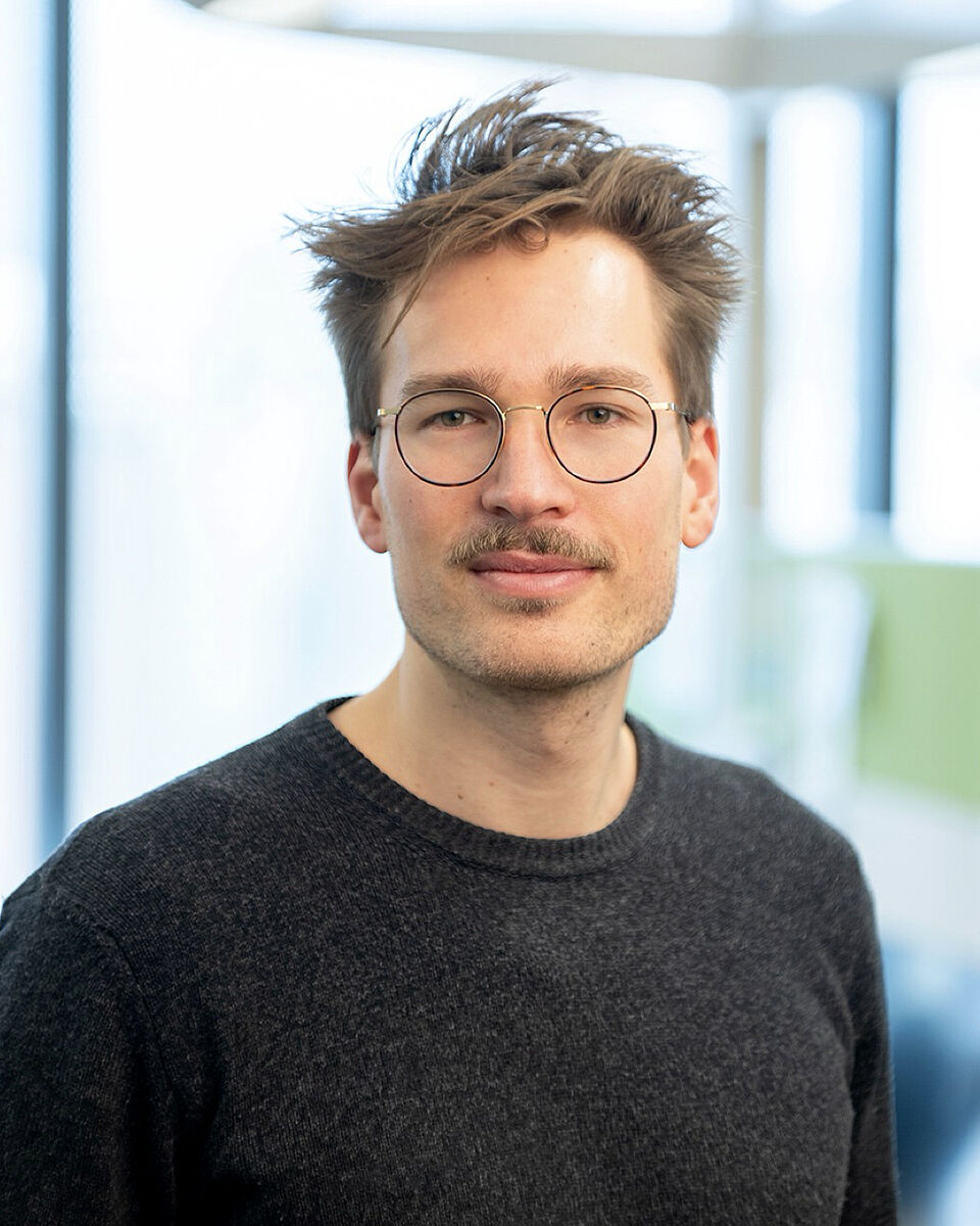 Dr. Marius Lange